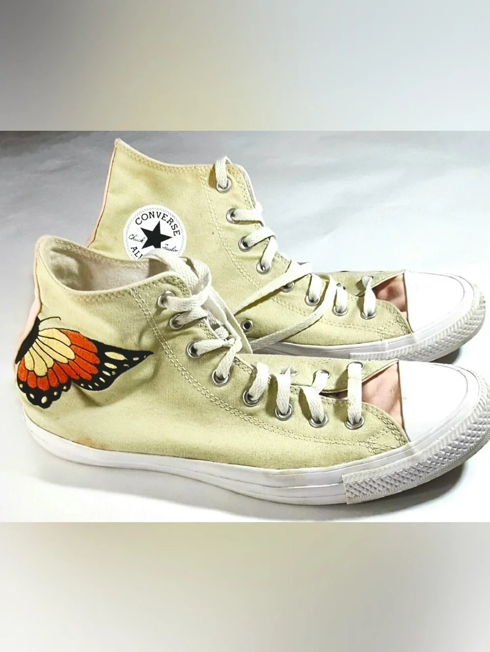 Converse High Top Sneakers in Beige with Orange Butterfly Accent
